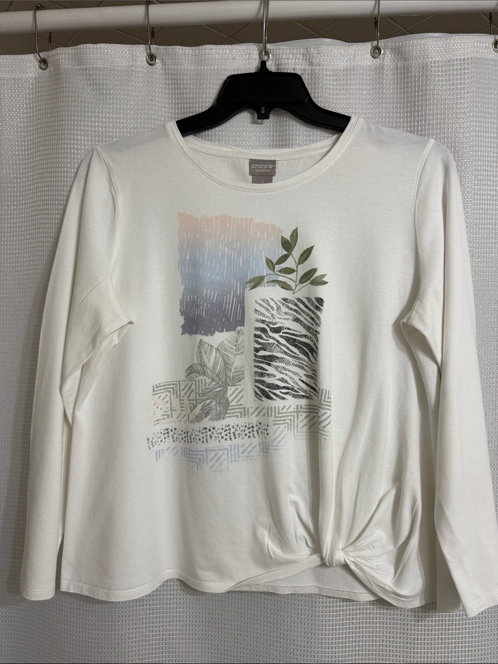 Chico’s Zenergy white long sleeve tee shirt. Size 2 (12/14)